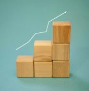 stack of blocks showing progress improvement over time, representing the academic gains made by students attending Fit Learning St. Louis, where kids improve an average of 1-2 grade levels in 40 hours